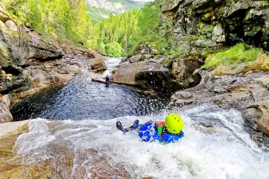 Canyoning with lunch - rappelling and sliding down pools, rapids and river gorges